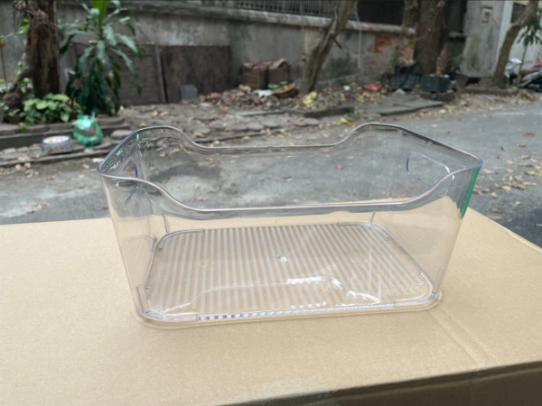 Plastic tray for storage or food in the refrigerator without lid