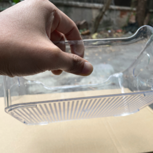 Plastic tray for storage or food in the refrigerator without lid