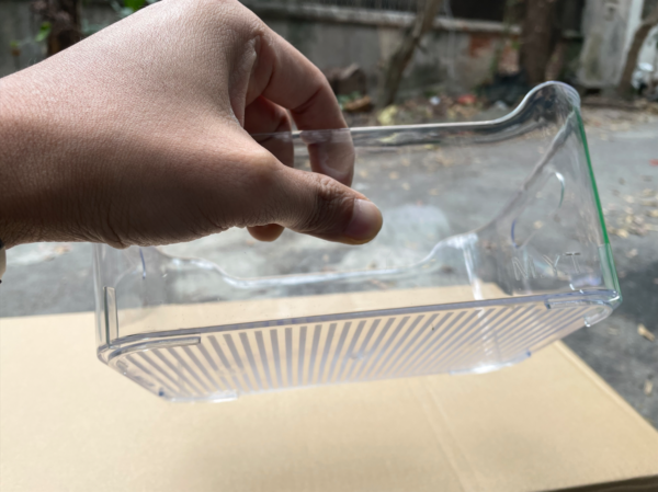 Plastic tray for storage or food in the refrigerator without lid