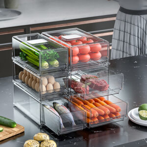 Plastic storage box for food and vegetables for the refrigerator with drainage tray